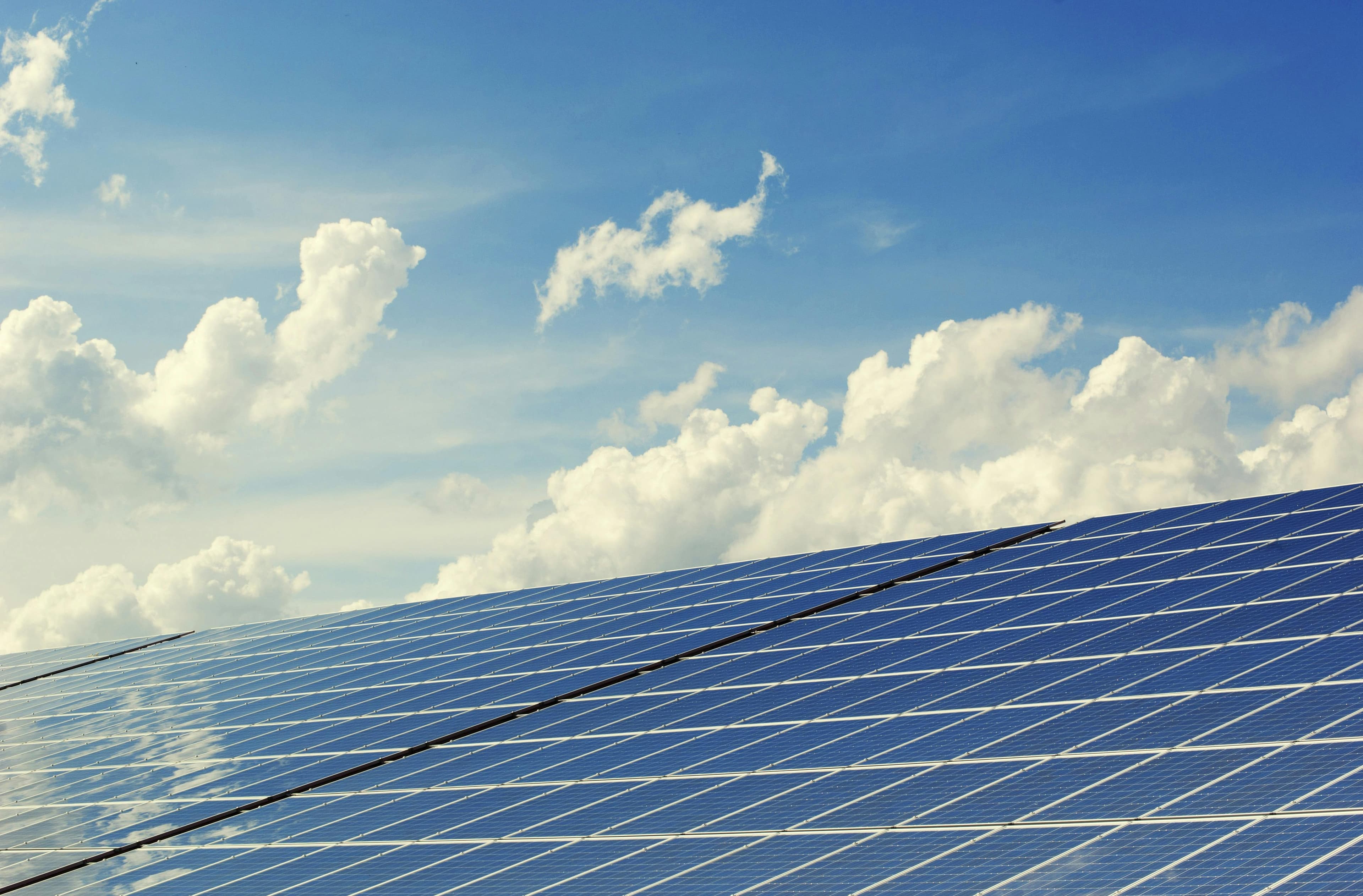 Solar panels against blue sky